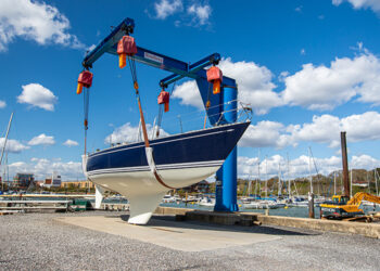 Yacht in static crane prior to launching