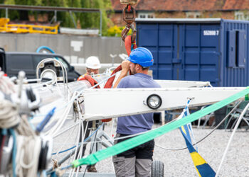 Preparing a yachts mast before being stepped