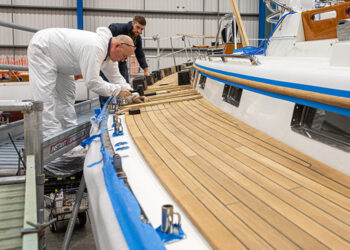 Fitting a new teak deck onboard a yacht