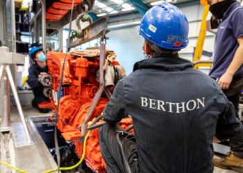 Fitting a newly serviced engine on a commercial vessel