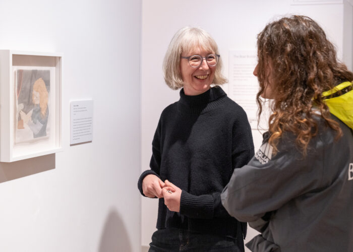 Emily talking with Steph about her portrait